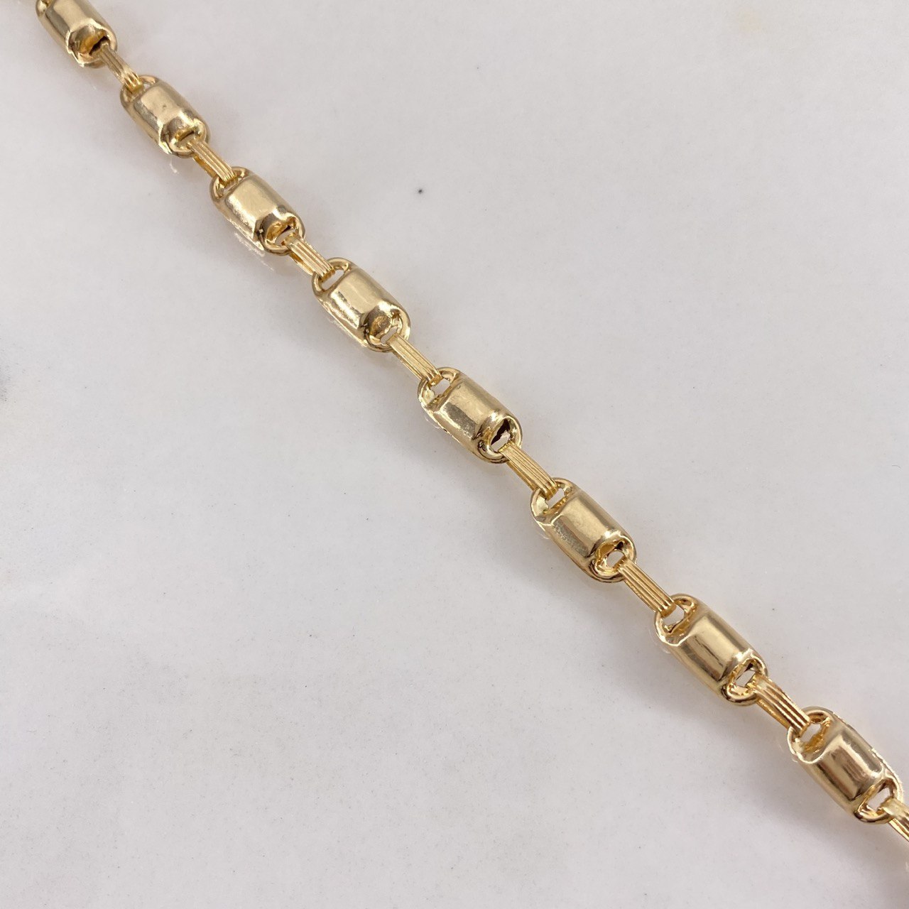 Cadena Rustica Rayada 16gr / 60cm / 4.5mm Barril Liso    Oro Amarillo $