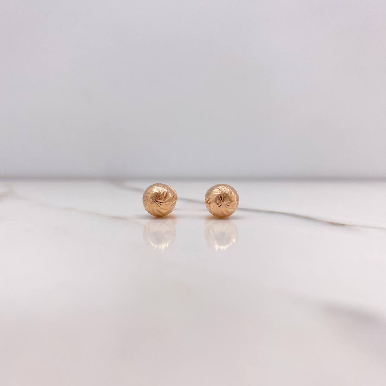 Topos Bola 0.8gr / 7mm Diamantada Oro Rosa $