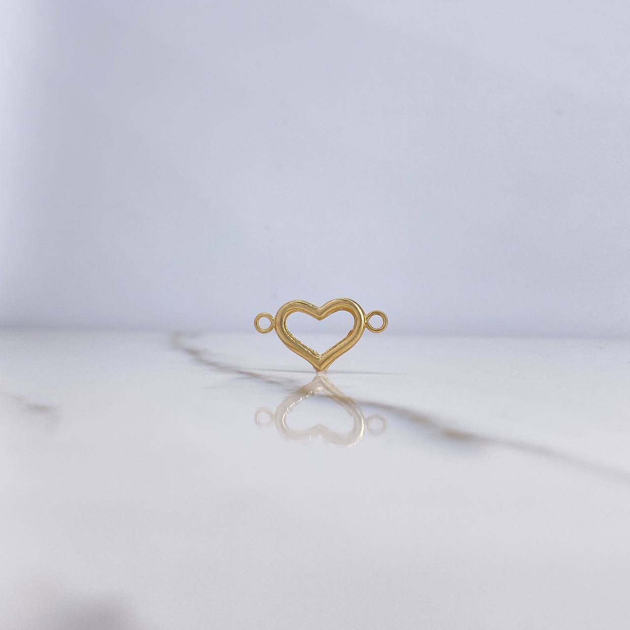 Herraje Silueta Corazon 1.25gr / 2.3cm / Liso Oro Amarillo $