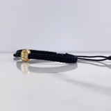 Pulsera Negra Herraje Letra I 0.55gr / 1cm / Tambor Oro Amarillo $