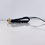 Pulsera Negra Herraje Letra S 0.55gr / 1.5cm / 5mm Troquelado Neoprenos Negros Oro Amarillo $