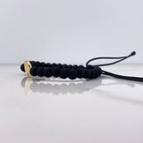 Pulsera Negra Herraje Letra U 0.55gr / 1.5cm / 5mm Troquelado Neoprenos Negros Oro Amarillo $