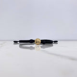 Pulsera Negra Herraje Balon Futbol 0.55gr / 1cm / 5mm Tambor Neoprenos Negros Oro Amarillo $