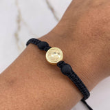 Pulsera Negra Herraje Balon Futbol 0.55gr / 1cm / 5mm Tambor Neoprenos Negros Oro Amarillo $