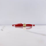 Pulsera Roja Herraje Letra J 0.55gr / 1cm / Tambor Oro Amarillo $