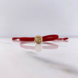 Pulsera Roja Herraje Letra G 0.55gr / 1cm / Tambor Oro Amarillo $