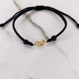 Pulsera Negra Herraje Letra L 0.55gr / 1.5cm / 5mm Troquelado Bolas Neoprenos Negras Oro Amarillo $