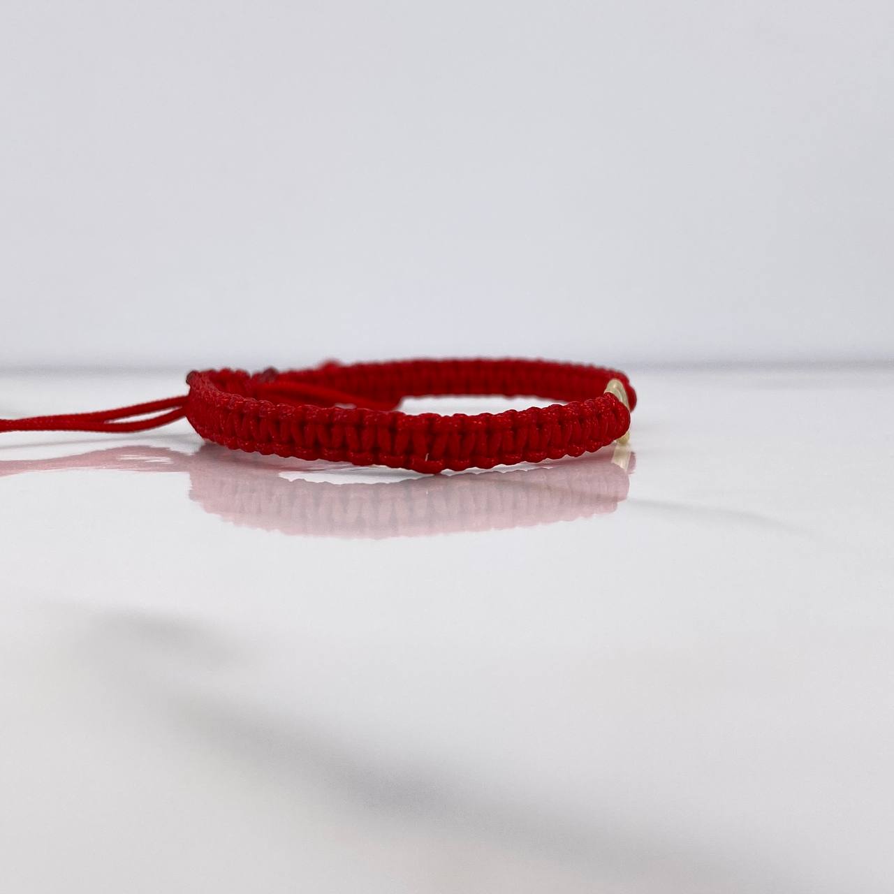 Pulsera Roja Infinito 0.3gr / 1.4cm / Oro Amarillo $