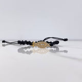 Pulsera Negra Pez Jesus 1.25gr / 2.2cm / Circones Blancos Oro Amarillo $