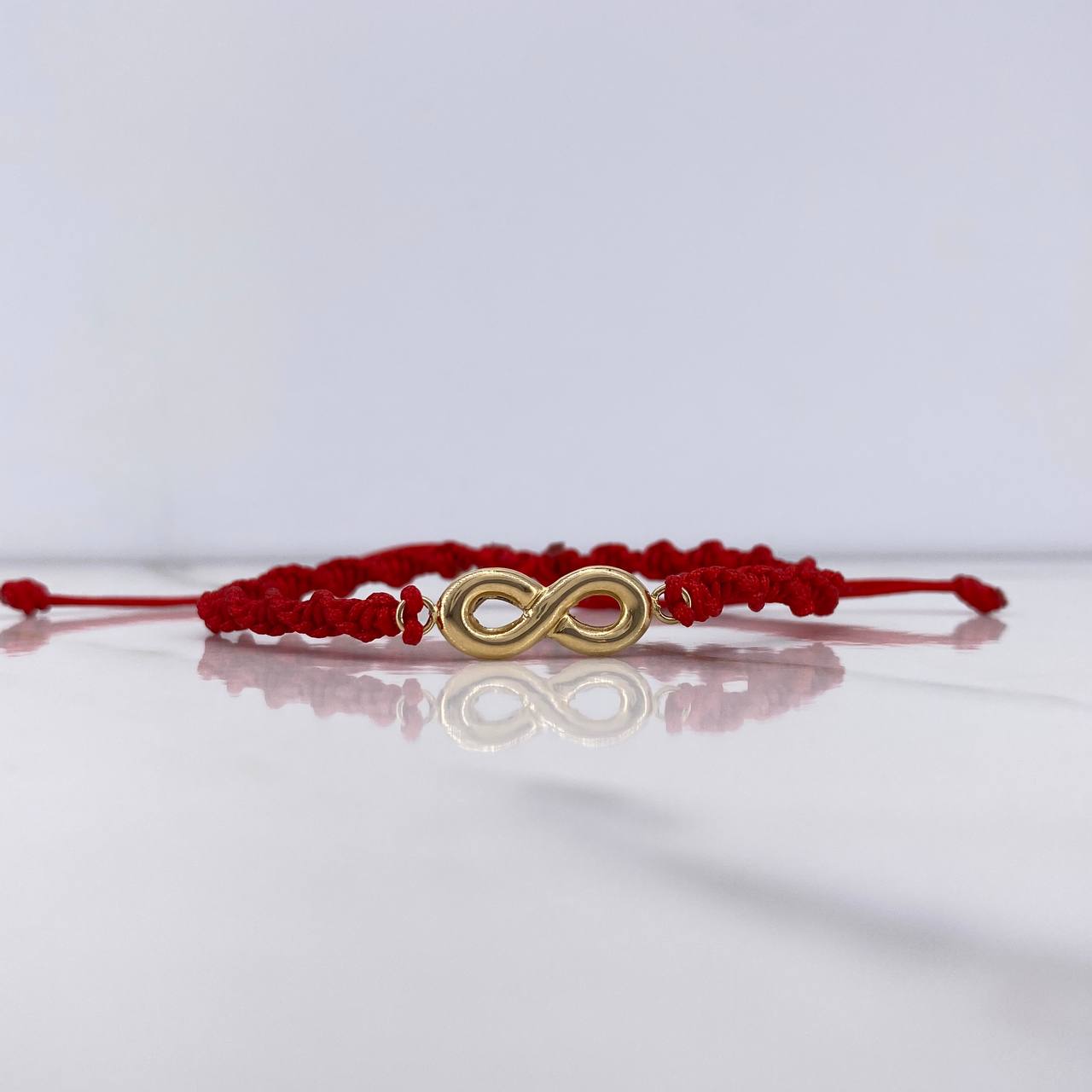 Pulsera Roja Infinito 0.75gr / 2.4cm / Oro Amarillo $