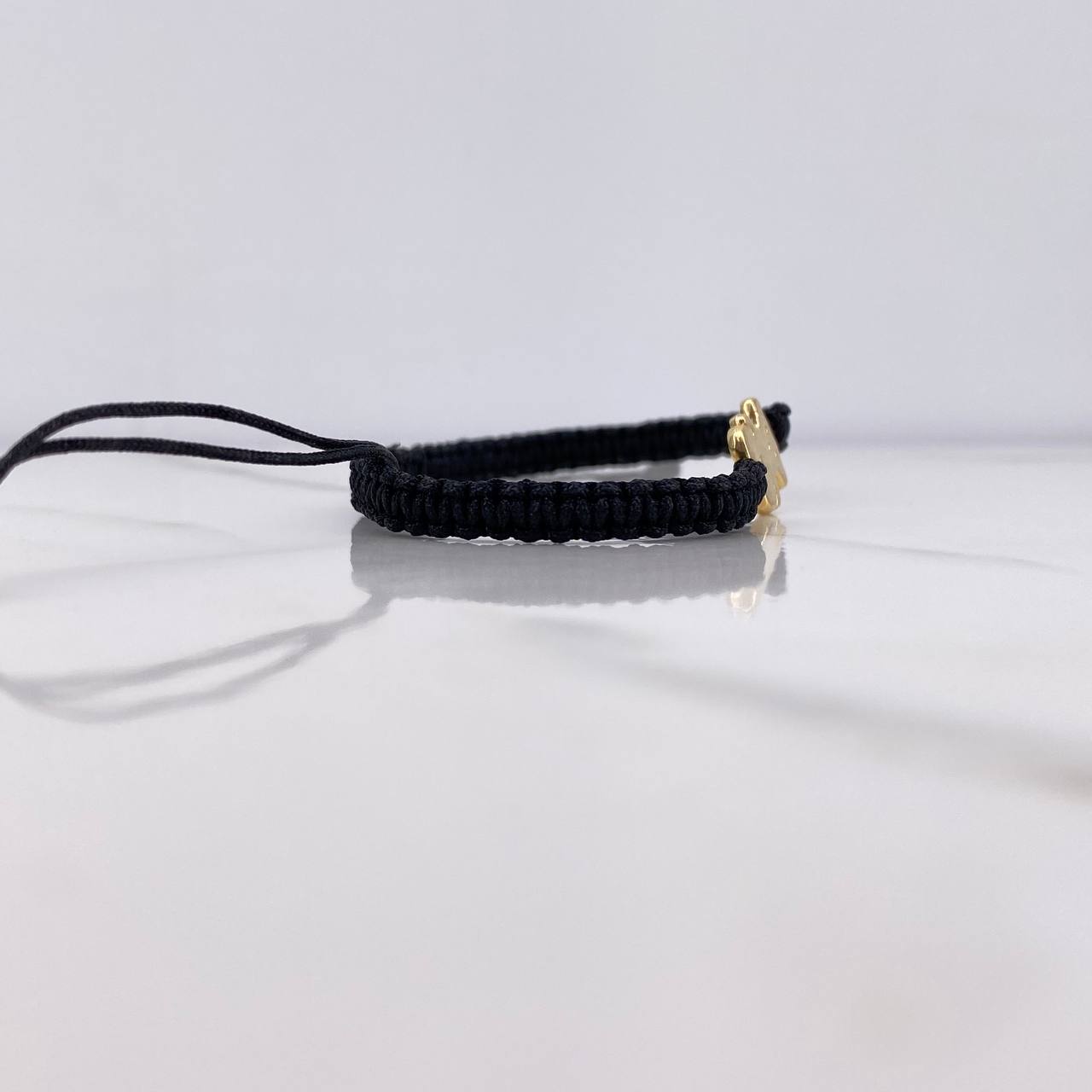 Pulsera Negra Oso Ts 0.6gr / 1.5cm / Oro Amarillo $