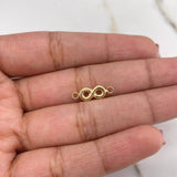 Herraje Infinito 0.35gr / 1.5cm / Liso Oro Amarillo $