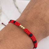 Pulsera Roja Bolas Diamantadas 0.25gr / 3mm Neoprenos Negros Oro Amarillo $