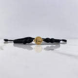 Pulsera Negra Herraje Letra E 0.55gr / 1.5cm / 5mm Troquelado Bolas Neoprenos Negras Oro Amarillo &