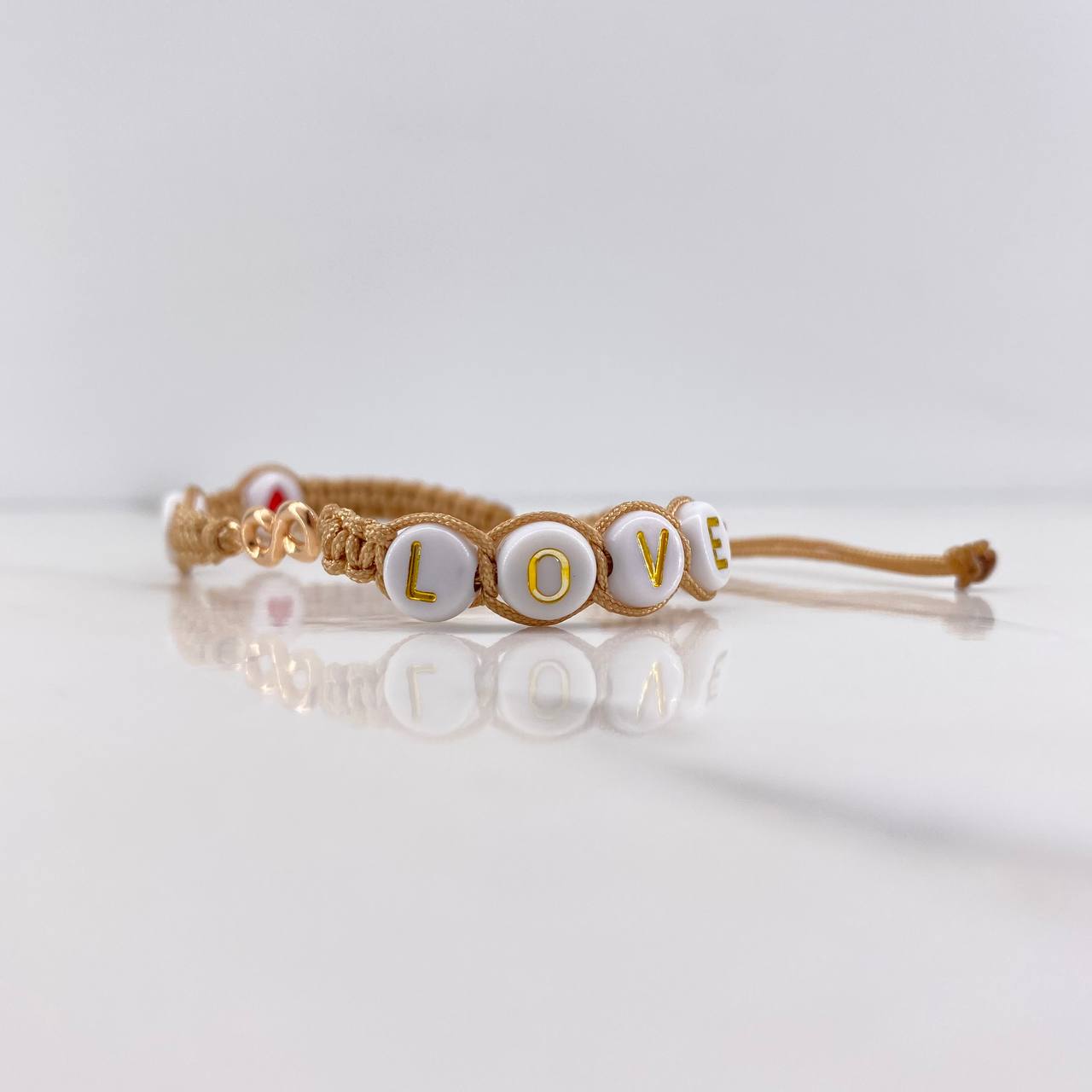 Pulsera Beige Herraje Infinito 0.3gr / 1.4cm / Liso Oro Rosa &