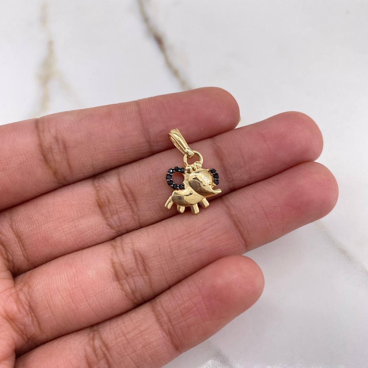 Dije Elefante 1.45gr / 1.7cm / Circones Negros Oro Amarillo $