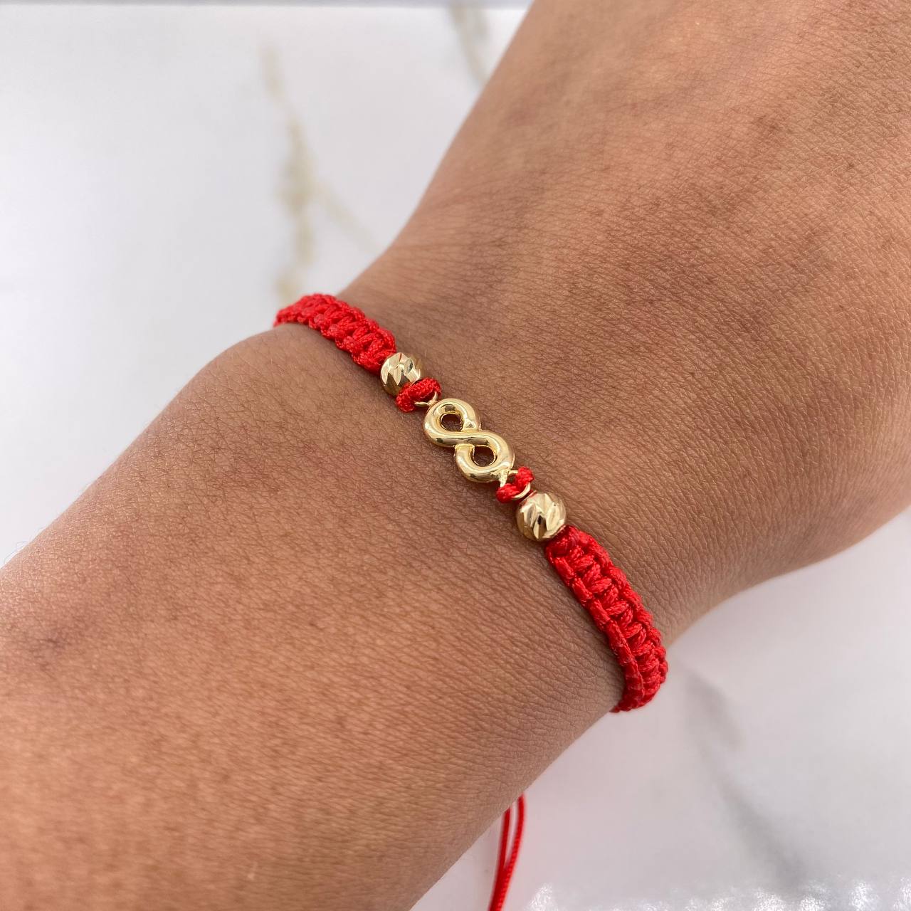 Pulsera Roja Herraje Infinito 0.65gr / 3mm-4mm Bolas Diamantadas Oro Amarillo &