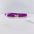 Pulsera Morada Bolas Diamantadas 0.15gr / 3mm Oro Amarillo $