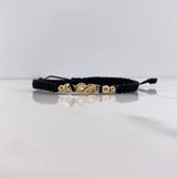 Pulsera Negra Herraje Infinito 0.95gr / 3mm-4mm Bolas Diamantadas Oro Amarillo $