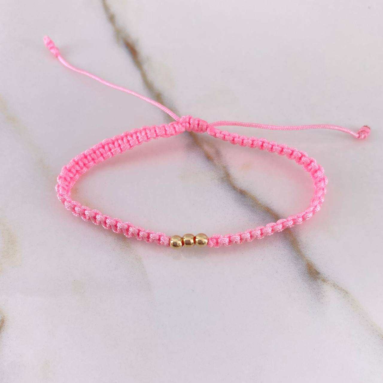 Pulsera Rosado Bolas Lisas 0.15gr / 3mm Oro Amarillo $