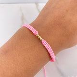 Pulsera Rosado Bolas Lisas 0.15gr / 3mm Oro Amarillo $