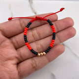 Pulsera Roja Negra Mostazilla 0.15gr / 3mm Bolas Lisas Oro Rosa $