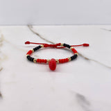 Pulsera Roja Negra Mostazilla 0.55gr / 3mm Pie Bolas Diamantadas Oro Amarillo $