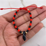 Pulsera Roja Negra Mostazilla 0.2gr / 3mm Pie Bolas Lisas Oro Amarillo $