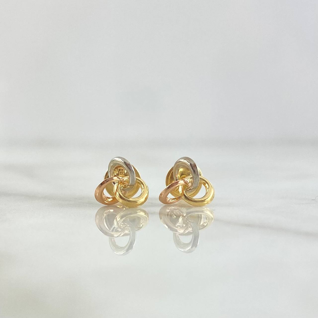 Topos Helice 0.7gr / 7mm Tres Oros 18K $