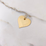 Dije Placa Corazon 2.4gr / 2.5cm / Rayado Oro Amarillo $