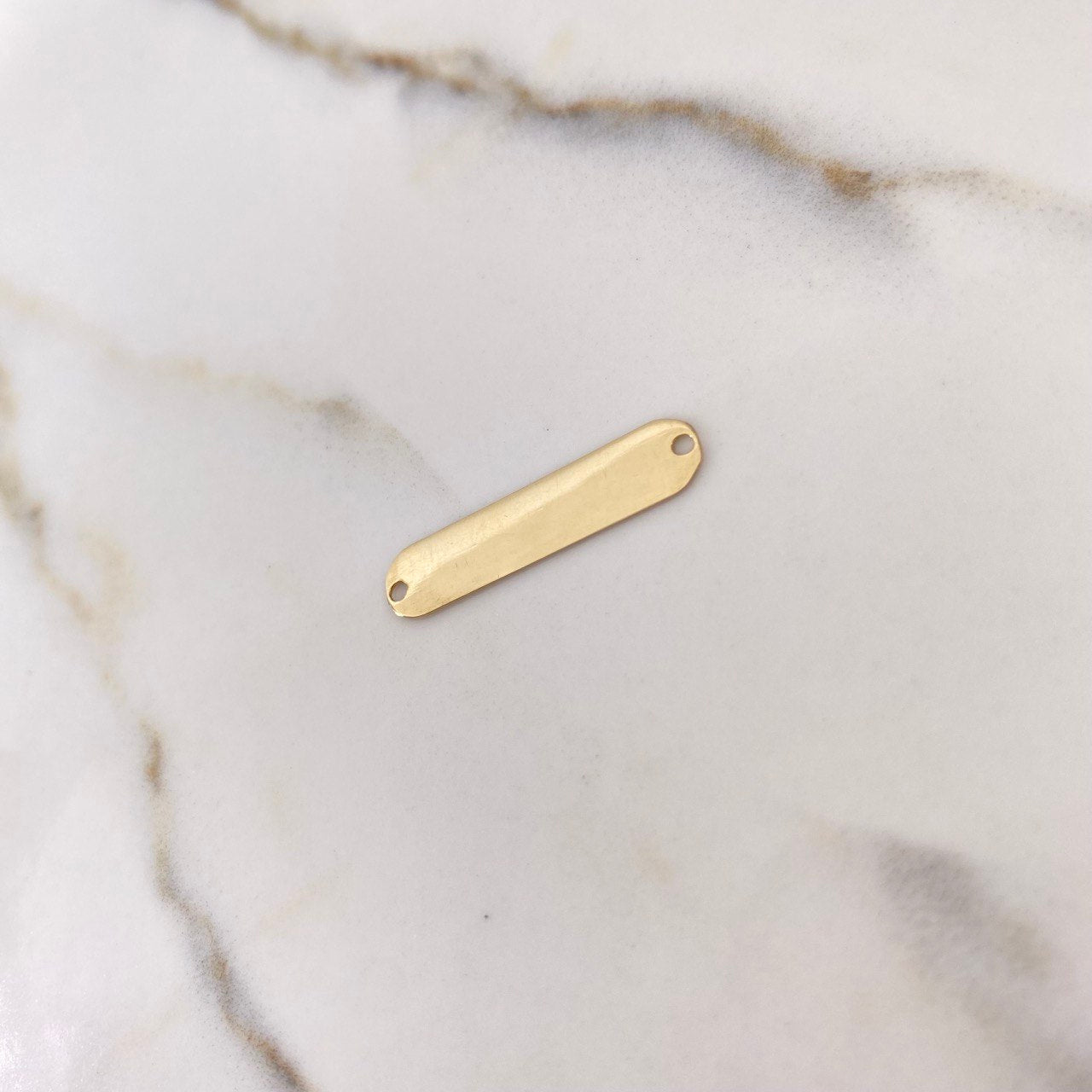 Herraje Placa Ovalada 0.7gr / 2.5cm / Lisa Oro Amarillo $