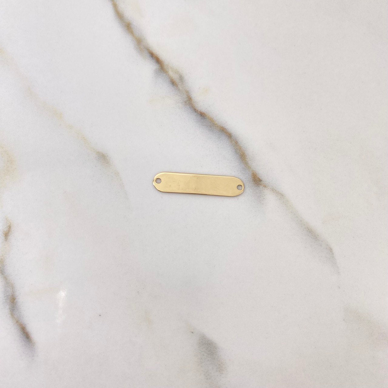 Herraje Placa Ovalada 0.65gr / 2.5cm / Lisa Oro Amarillo $