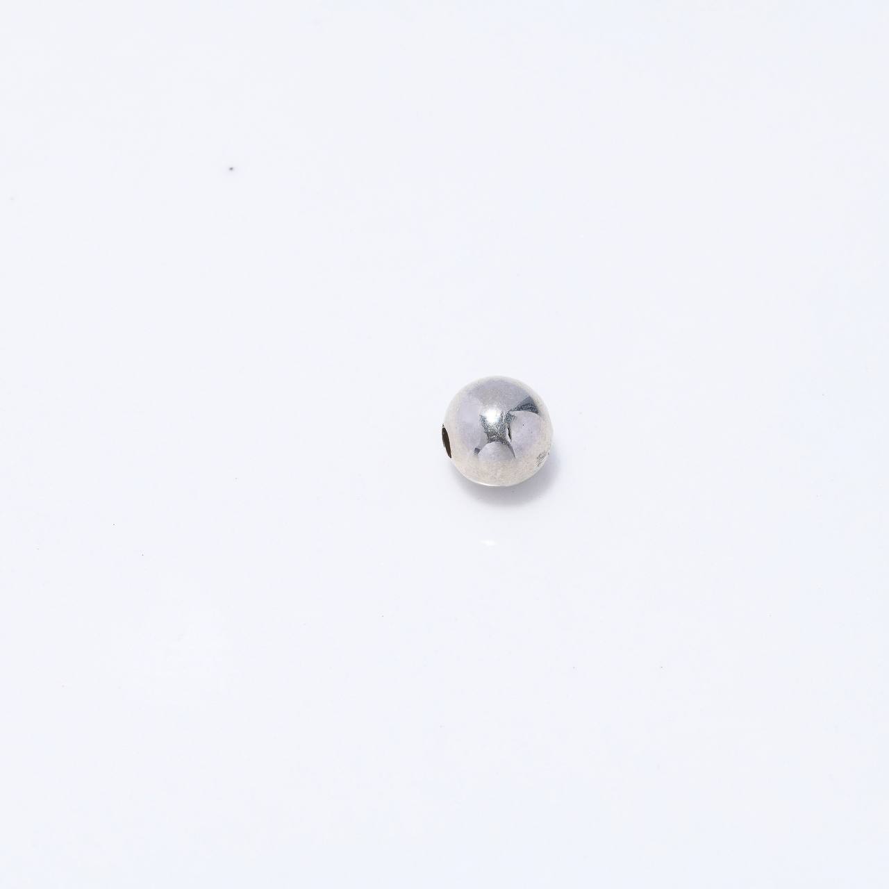 Bola Lisa 0.25gr / 7mm Oro Blanco $