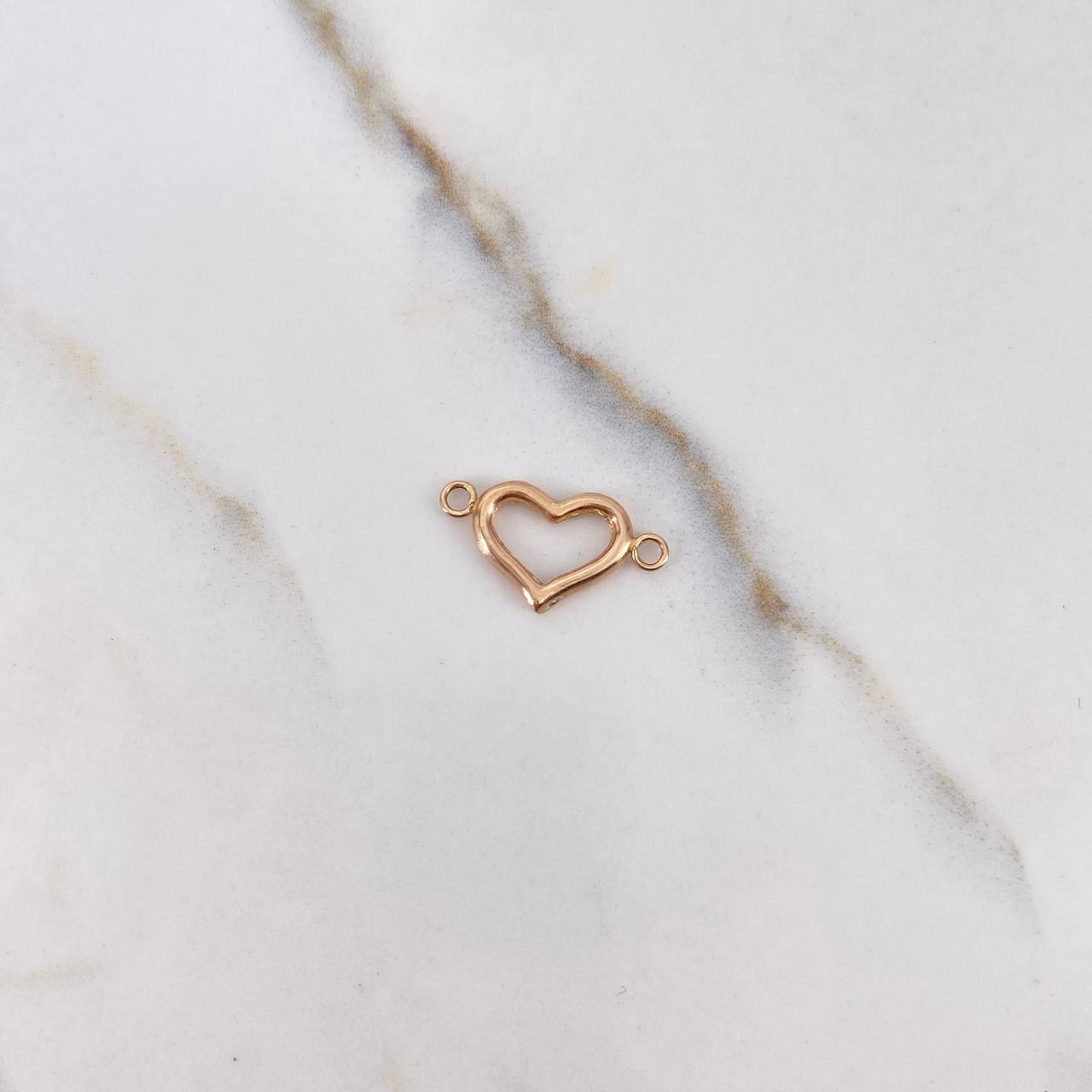 Herraje Silueta Corazón 0.5gr / 1.7cm / Liso Oro Rosa $