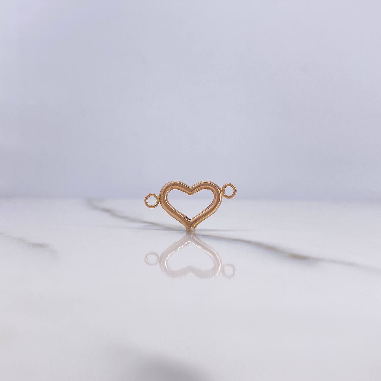 Herraje Silueta Corazón 0.5gr / 1.7cm / Liso Oro Rosa $