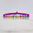 Pulsera Morada Lineal 0.8gr / 4mm Bolas Lisas Oro Amarillo $