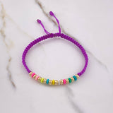 Pulsera Morada Lineal 0.8gr / 4mm Bolas Lisas Oro Amarillo $