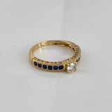 Anillo BV 2.75gr / T6 1/2 / Solitario Circones Blancos Azules  Oro Amarillo$