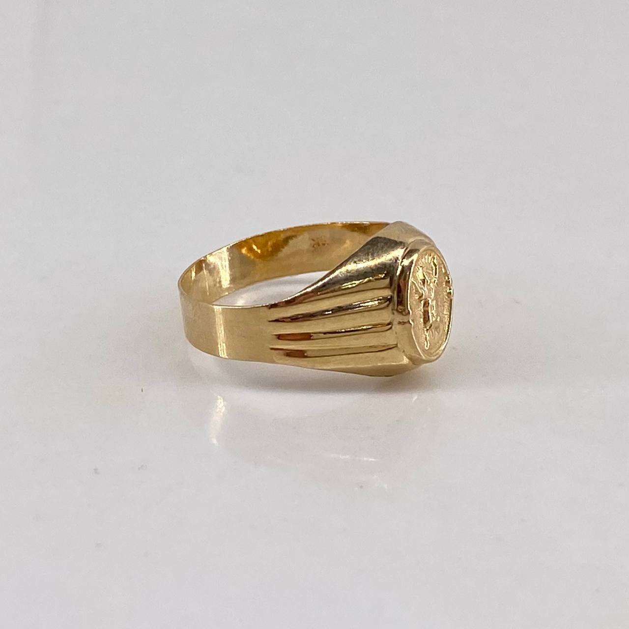 Anillo Sello Divino Niño  1.65gr / T5 1/4 / Relieve  Oro Amarillo$