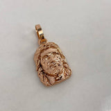 Dije Rostro Cristo  1.9gr / 2cm / Liso Oro Rosa$