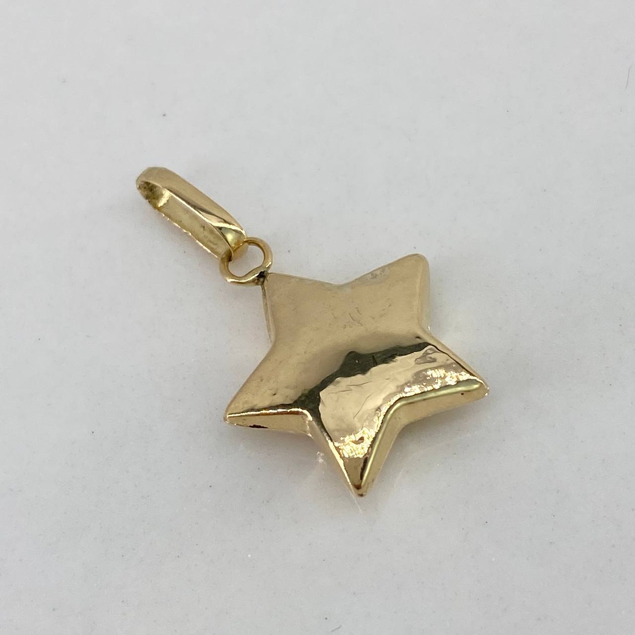 Dije Estrella 0,8gr / 2cm / Liso Oro Amarillo$