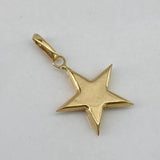 Dije Estrella 0,7gr / 2,5cm / Liso Oro Amarillo$