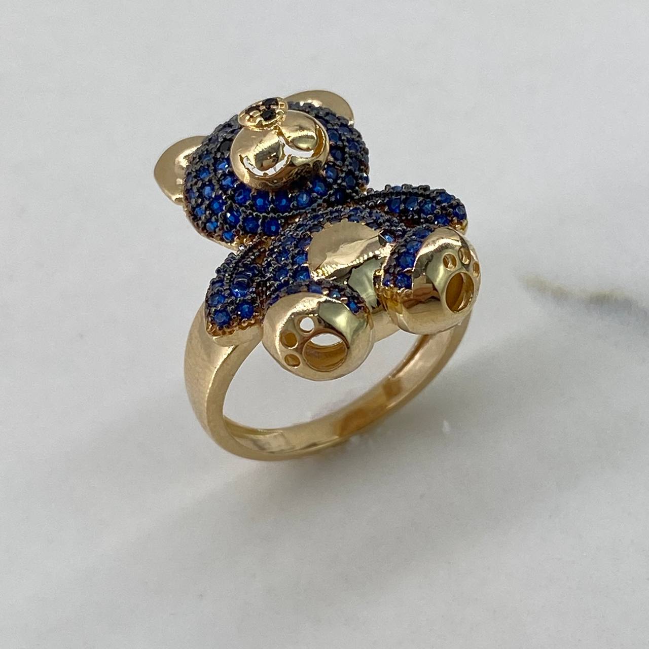 Anillo Oso  8.2gr / T7 1/4 / Cirocnes Azules Negros  Oro Amarillo$