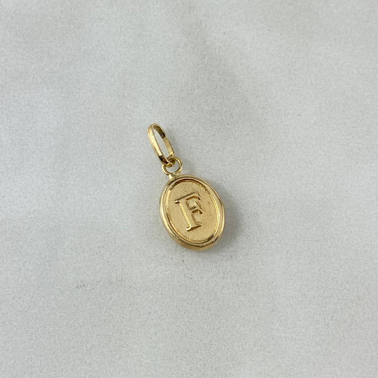 Dije Letra F Ovalada 0.4gr / 1.8cm / Troquelada Oro Amarillo