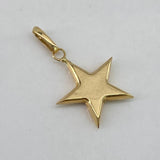 Dije Estrella  0.7gr / 2.5cm / Liso  Oro Amarillo $