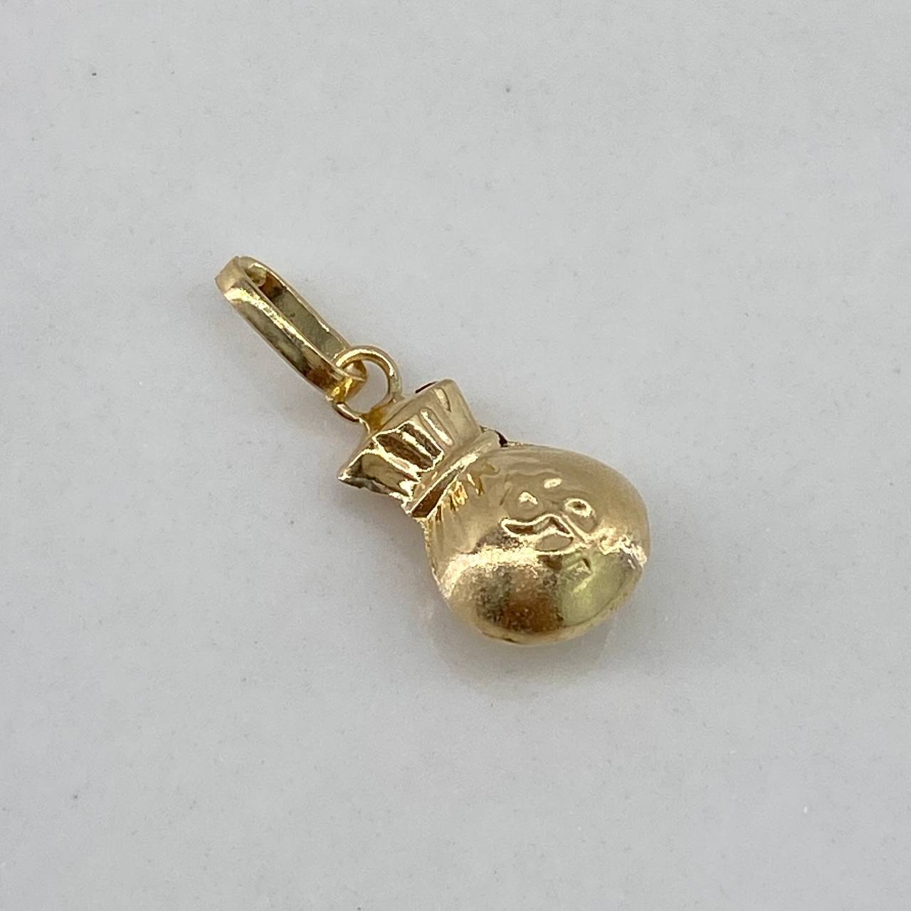 Dije Bolsa de Dinero  0.4gr / 1.5cm / Liso  Oro Amarillo $