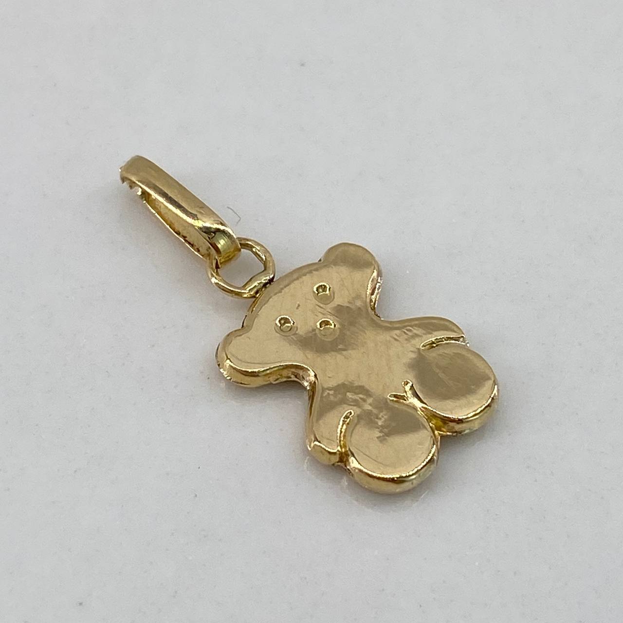 Dije Oso Ts  0.6gr / 2cm / Liso  Oro Amarillo $