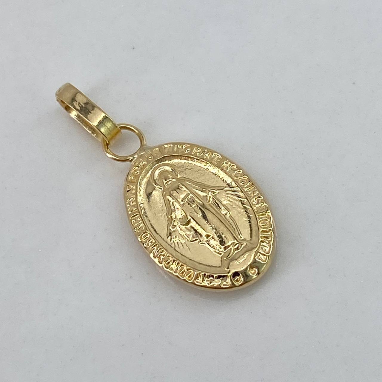 Dije Virgen Milagrosa  0.85gr / 2cm / Liso  Oro Amarillo $