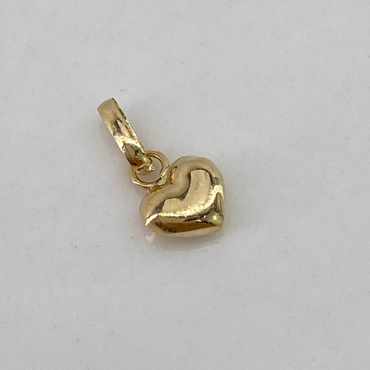 Dije Corazon  0.15gr / 1cm / Soplado  Oro Amarillo $