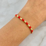 Pulsera Roja Cilindrica Separada 1.4gr / 2mm Diamantada 18 und Oro Amarillo ©